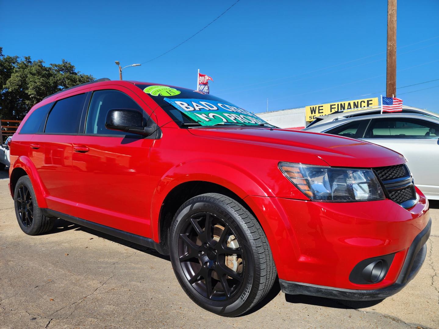 2015 RED Dodge Journey SXT (3C4PDCBBXFT) with an 2.4L L6 DOHC 16V engine, 4-Speed Automatic transmission, located at 2660 S.Garland Avenue, Garland, TX, 75041, (469) 298-3118, 32.885551, -96.655602 - Welcome to DallasAutos4Less, one of the Premier BUY HERE PAY HERE Dealers in the North Dallas Area. We specialize in financing to people with NO CREDIT or BAD CREDIT. We need proof of income, proof of residence, and a ID. Come buy your new car from us today!! This is a SUPER CLEAN 2015 DODGE JOUR - Photo#1